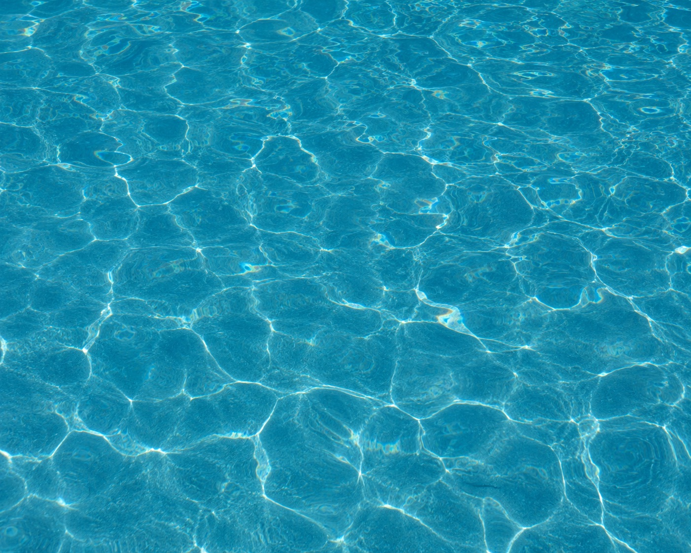 Crystal-clear balanced pool water — Al Kahaf water quality management.
