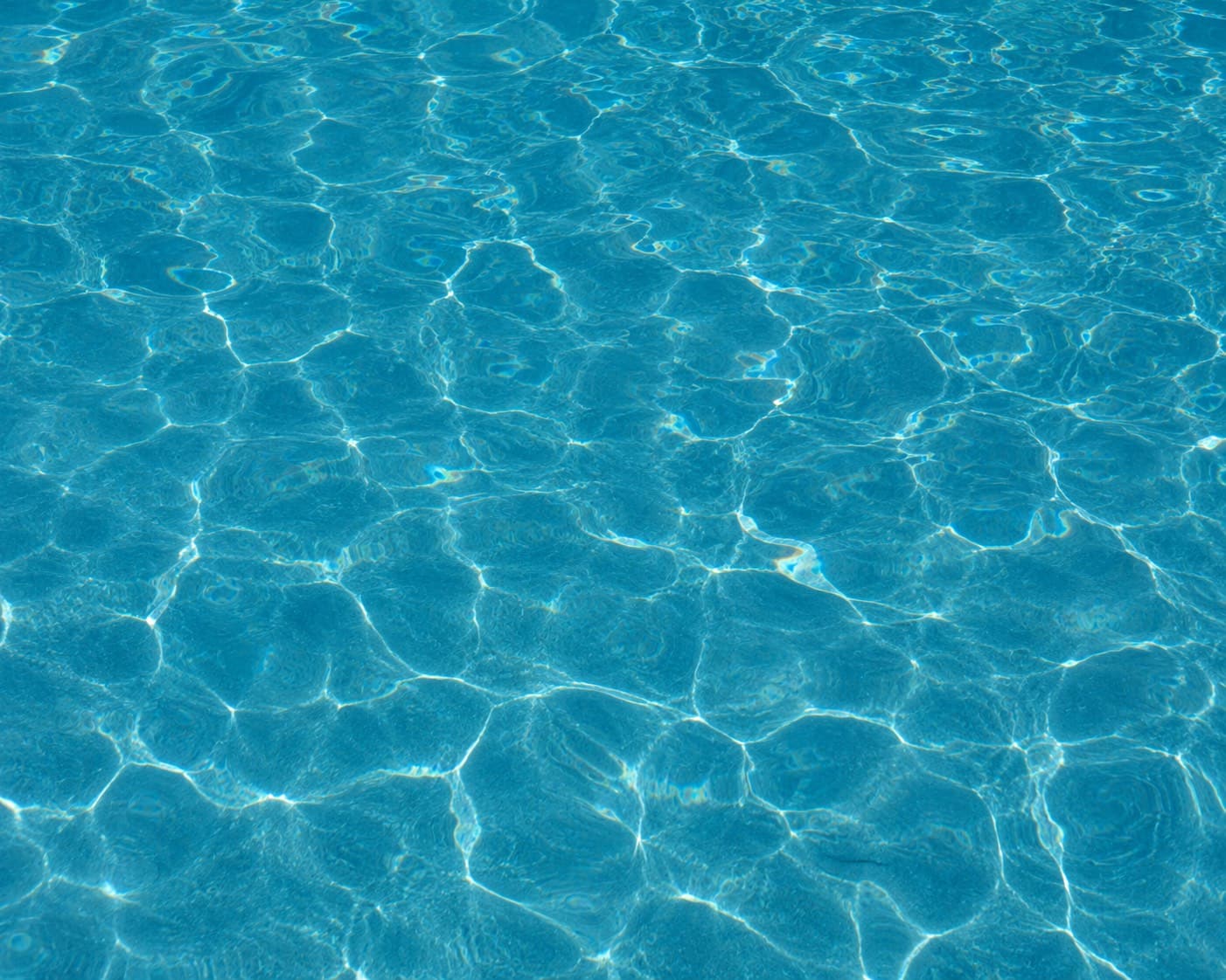 Crystal-clear balanced pool water — Al Kahaf water quality management.